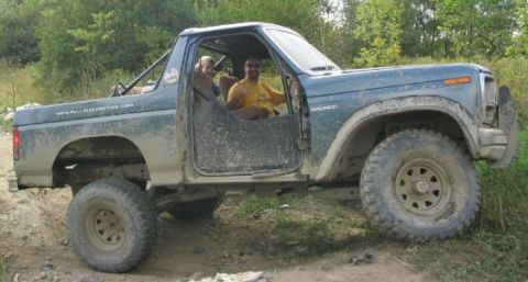 1986 Ford Bronco - This Ford Bronco appears to be from the early 1980s, not 1986, as it is seen off-roading with two occupants.