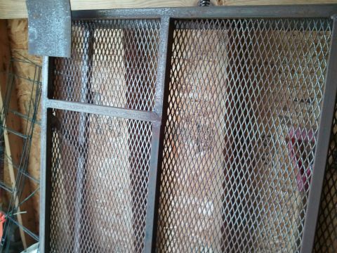 1995 Ford Bronco - A close-up view of a metal mesh panel, likely a part for a vehicle or structure.