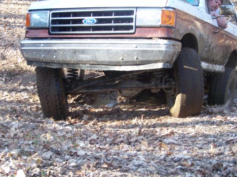 1989 Ford Bronco - This 1989 Ford Bronco is stuck in the mud off-road.