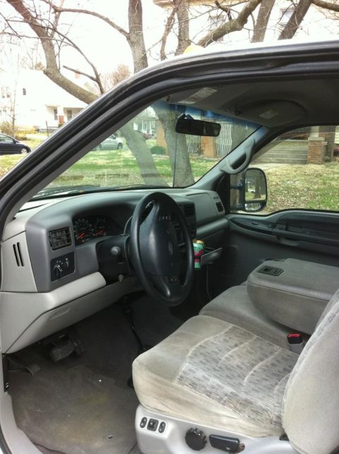 2000 Ford F-250 - Interior view of a 2000 Ford F-250 pickup truck, highlighting the dashboard and seating area.