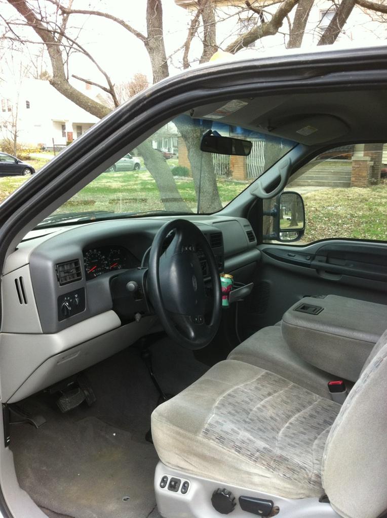 2000 Ford F-250 interior showing dashboard, steering wheel, seats, and door panel