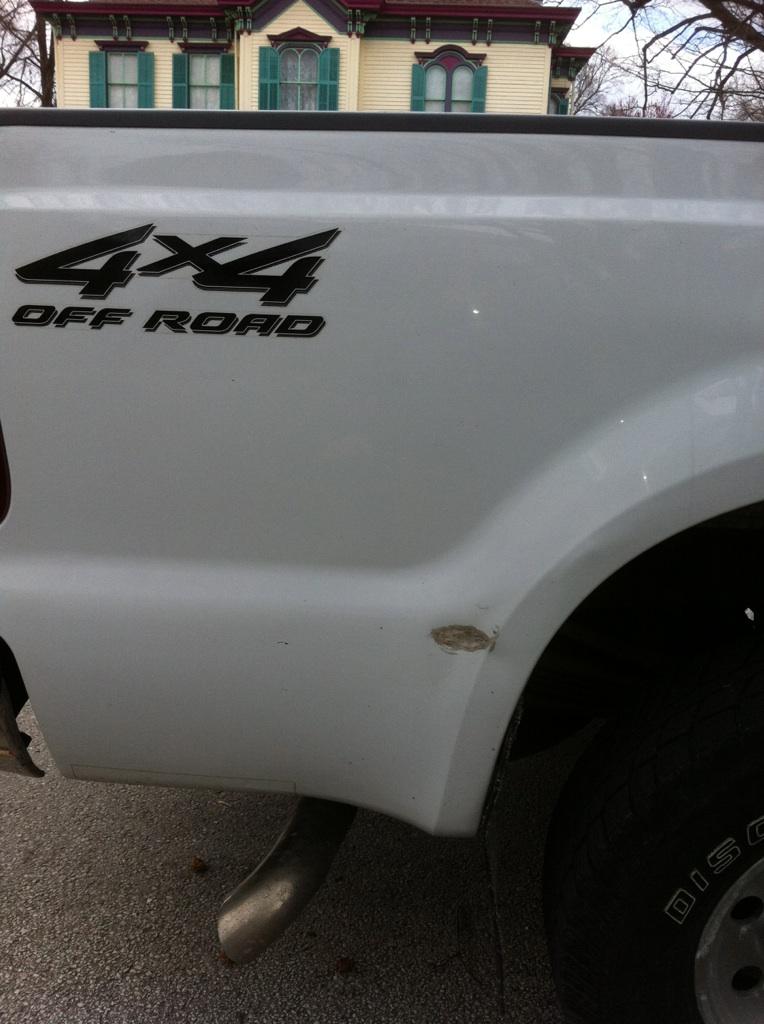 White pickup bed side with black 4x4 Off Road decal