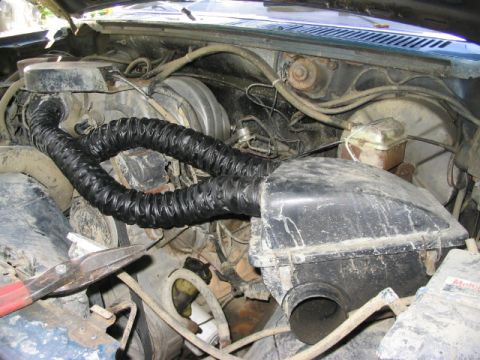 1986 Ford Bronco - Mounted to engine intake