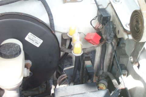 1995 Ford Bronco - Put the filter through the top and sandwiched the mount with 1/4" fuel line.
