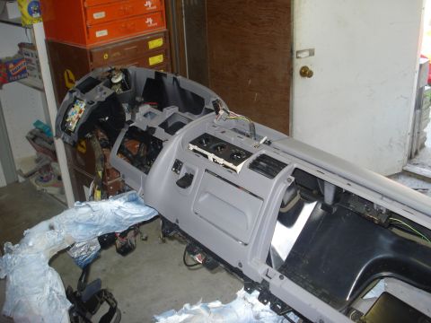 1993 Ford F-150 - Vehicle dashboard assembly removed for restoration, showing internal components and wiring.