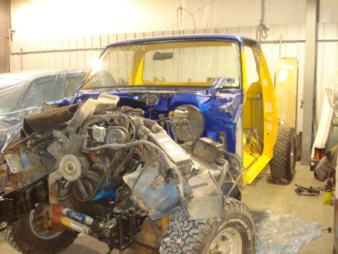 1993 Ford F-150 - Ford F-150 cab stripped down for restoration, showing the engine bay and interior.