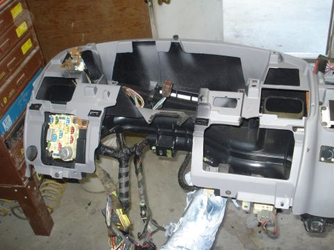 1993 Ford F-150 - Dashboard assembly removed from vehicle, showing internal wiring and components.