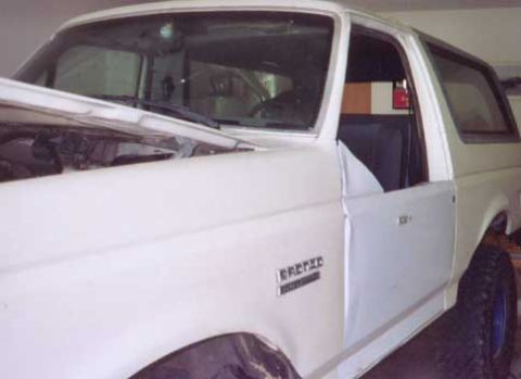 1987 Ford Bronco - driver half door on truck, not all done yet