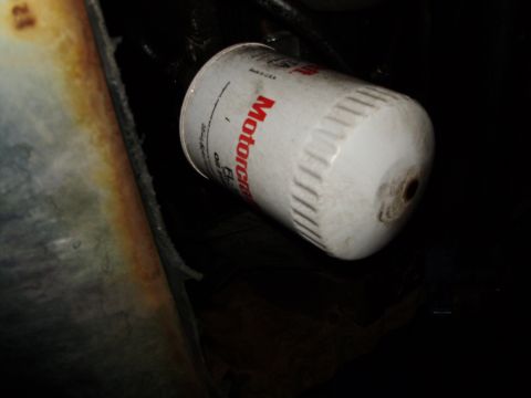 1995 Ford Bronco - A Motorcraft oil filter is visible, likely during an oil change.