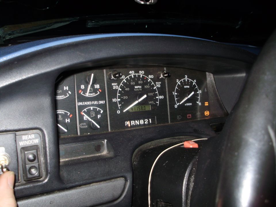 Ford Bronco instrument cluster showing 41158.8 miles on odometer, gauges, and rear window switch