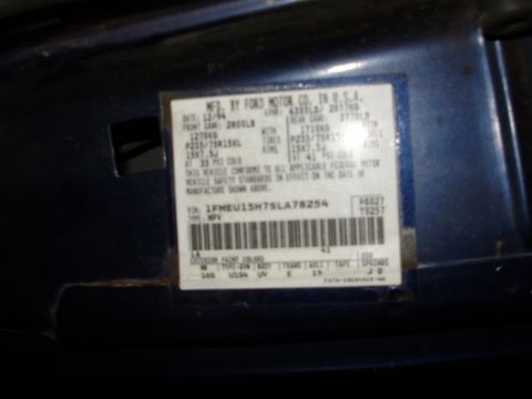 1995 Ford Bronco - Vehicle identification sticker shows manufacturing date of December 1994 and VIN 1FMEU15H7SLA78254.