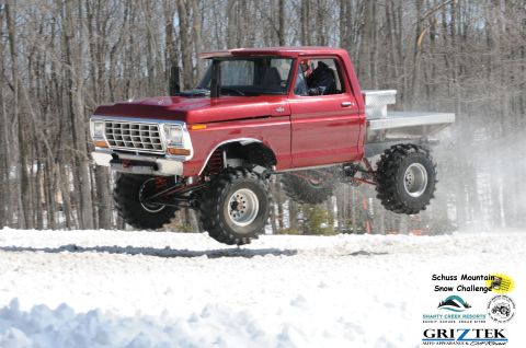 1978 Ford F-150 - A modified 1978 Ford F-150 truck takes flight during the Schuss Mountain Snow Challenge.