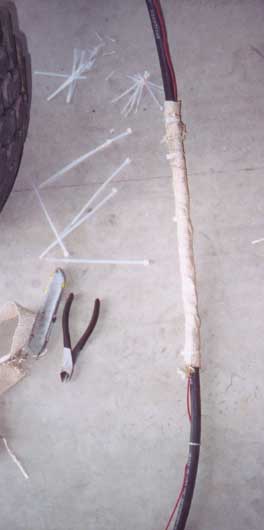 1987 Ford Bronco - header wrap around the air line and the wire going to the presure switch. I have a history of burning lines on my exhast manifold.
