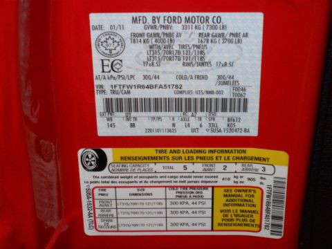 2011 Ford F-150 - Ford VIN sticker shows manufacturing date 01/11 and vehicle identification number.