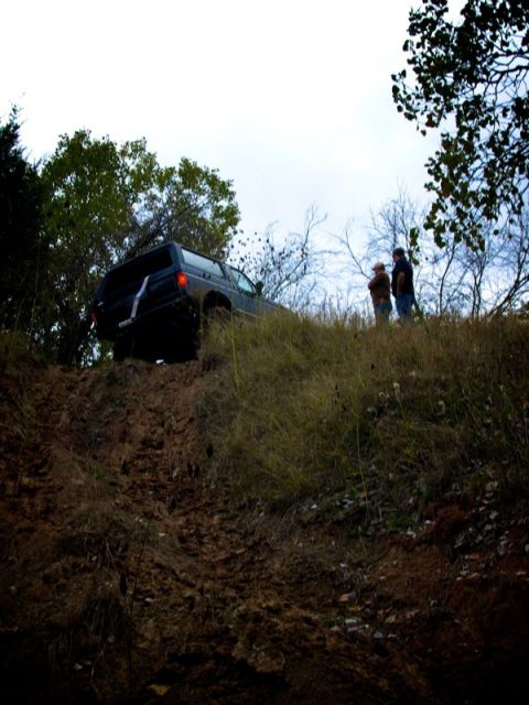 1995 Ford Bronco - 1995 Ford Bronco tackling an off-road trail.
