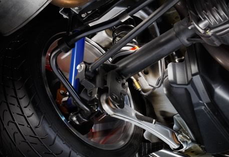 2012 Ford Mustang - Close-up view of the rear suspension system of a 2012 Ford Mustang.