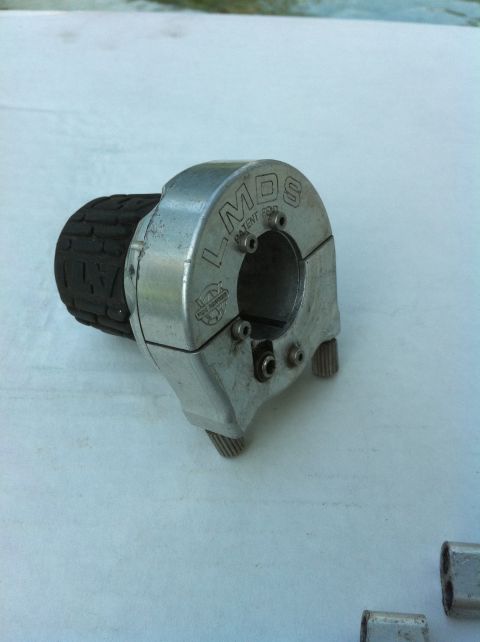 2010 Hyundai Genesis - Close-up of a motorcycle throttle assembly, marked 'LMDS' and 'PATENT PENDING'.