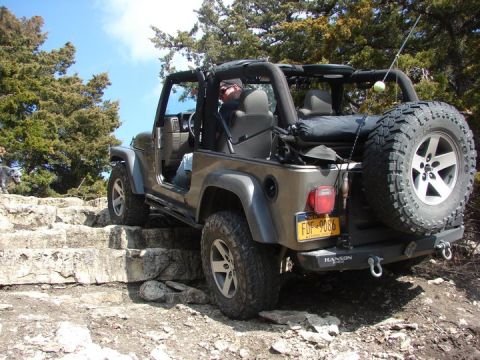 2005 Jeep Wrangler - This 2005 Jeep Wrangler navigates a rocky trail, its off-road capabilities.
