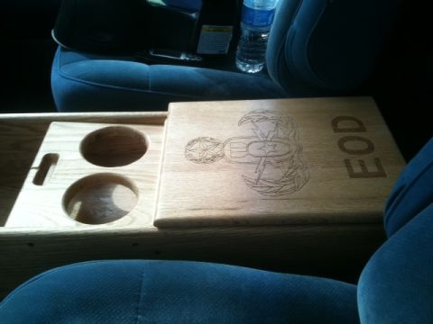 1988 Ford Bronco - Custom wooden center console with EOD insignia and cup holders is visible in the vehicle interior.
