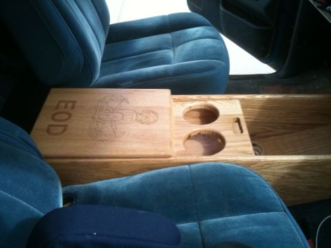 1988 Ford Bronco - A custom wooden center console with 'EOD' engraving is visible between the vehicle's front seats.