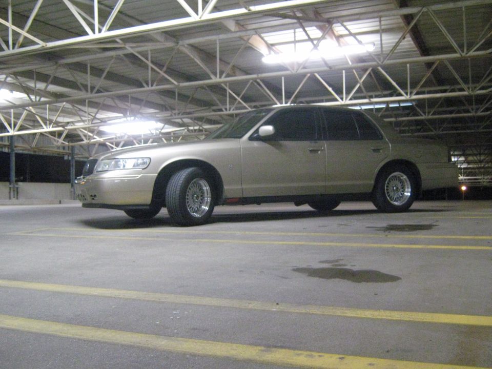 2000 Mercury Grand Marquis parked in a garage, side view