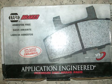 1998 Ford Crown Victoria - A box of NAPA Brakes premium disc brake pads is shown, with text indicating they are application engineered ceramics.