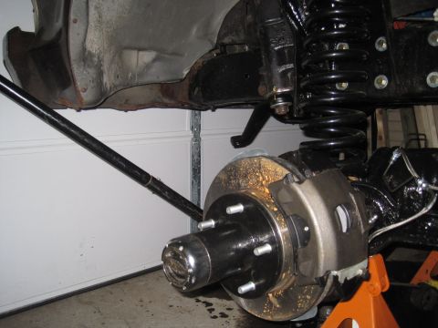 1979 Ford Bronco - The image shows a close-up of a vehicle's suspension and brake system, likely during maintenance or after maintenance.