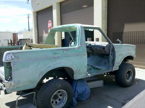 1995 Ford Bronco - This 1995 Ford Bronco is in primer, with its doors removed, ready for paint.