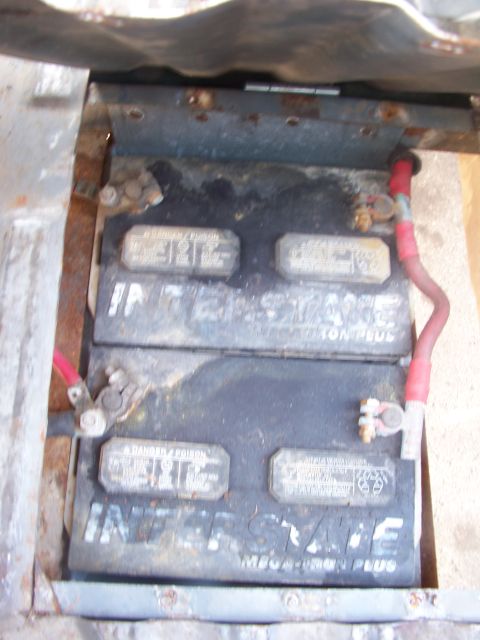 1989 Ford Bronco - The photo shows two Interstate Mega-Tron Plus batteries, likely in a vehicle's battery tray.