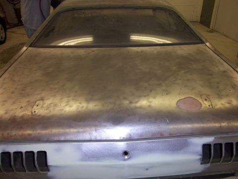 1971 Dodge Dart - Rear view of a 1971 Dodge Dart undergoing bodywork, showing the trunk lid and bumper area.