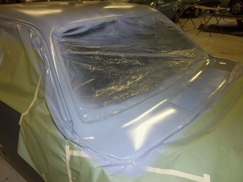 1971 Dodge Dart - A car is being prepped for painting, with its hood and windshield covered in plastic.