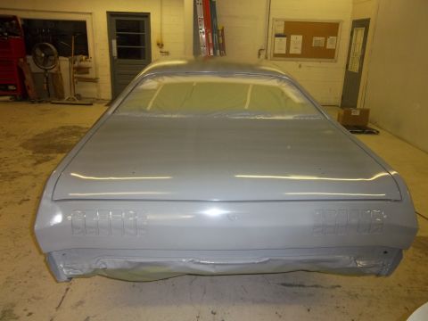 1971 Dodge Dart - Rear view of a 1971 Dodge Dart undergoing bodywork, with windows taped off.