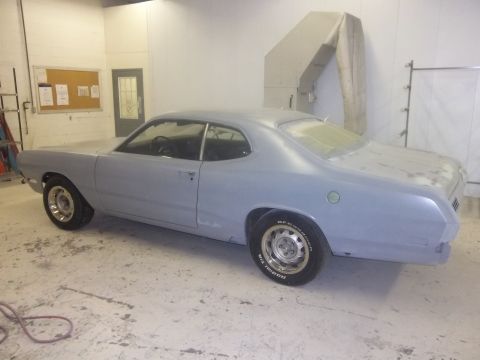 1971 Dodge Dart - This coupe body is in primer, indicating it is undergoing restoration or repair.