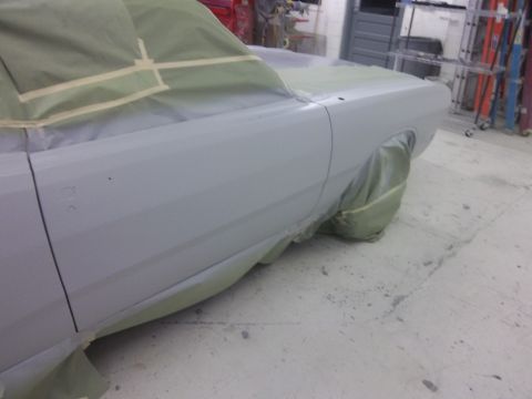 1971 Dodge Dart - Car bodywork in progress, covered for painting. Appears to be a 1971 Dodge Dart.
