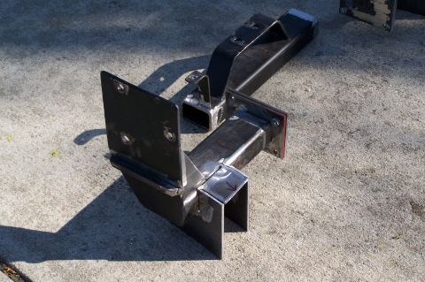 2000 Ford F-150 - Custom fabricated bumper brackets are shown resting on a concrete surface.