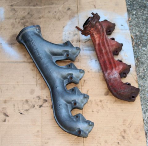 1976 Ford Ranchero - Two exhaust manifolds are shown, one appears to be a replacement part, the other is heavily rusted.