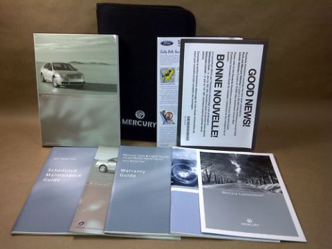 1994 Ford Bronco - Various Mercury vehicle documents are displayed, including a manual and warranty information.