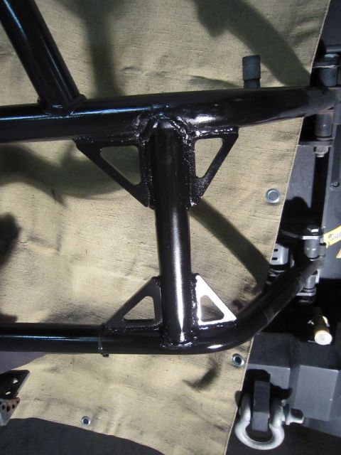 2008 Jeep Wrangler - Close-up view of a black metal roll cage structure, likely for an off-road vehicle.
