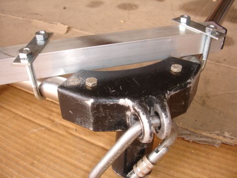 1993 Ford Taurus - This image shows a close-up of a camera mount's hardware, including a metal bracket and fasteners.