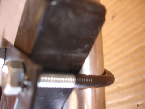 1993 Ford Taurus - Hardware for a camera mount is shown in a close-up view.