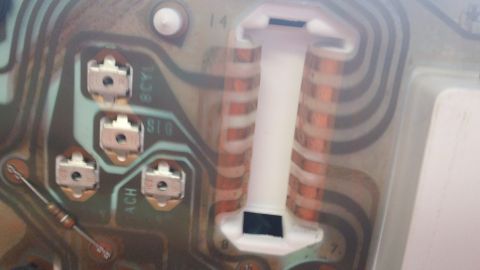 1994 Ford Bronco - Circuit board detail from an automotive instrument cluster, showing electronic components and wiring.