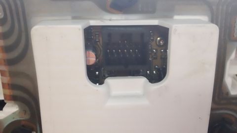 1994 Ford Bronco - This is a close-up view of the internal circuitry of a vehicle's instrument cluster, showing the electronic components and wiring.