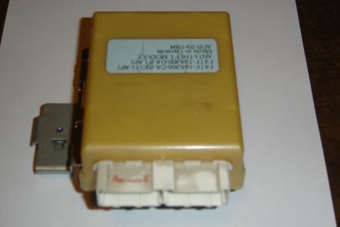 1996 Ford Bronco - A yellow anti-theft module is shown with its label and connectors.