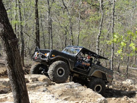 1967 Ford Mustang - A driver navigates a trail in a modified Ford Bronco, its off-road capabilities.