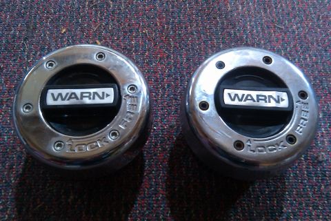 1993 Ford F-150 - Two Warn locking hubs are shown, labeled 'LOCK' and 'FREE'.