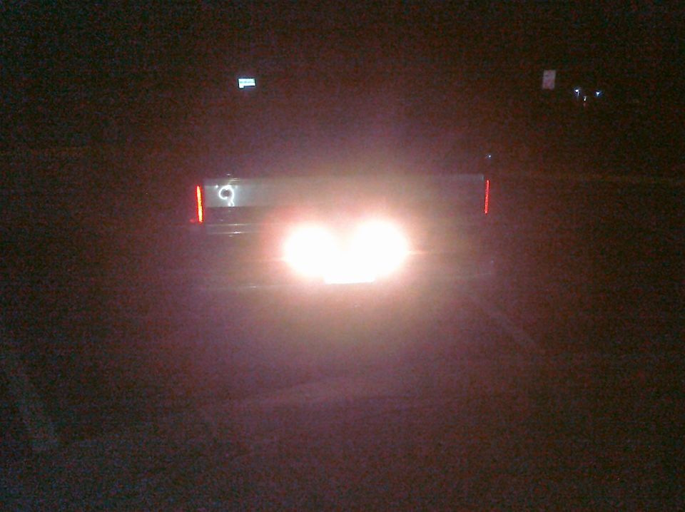 1995 Ford Bronco rear view with illuminated brake lights and '95 badge