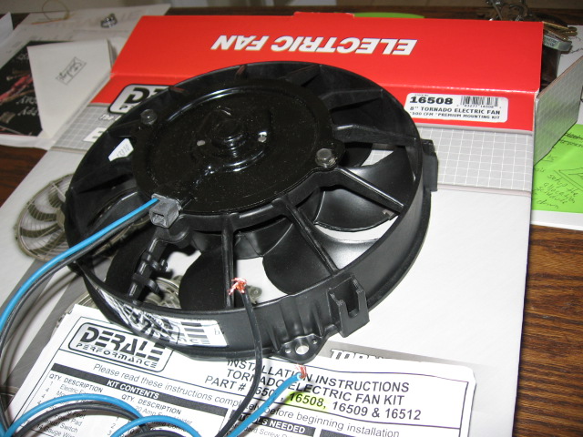 So I bought the dereale 8", 500cfm puller fan that draws 4.8amp.  It will sit right behind the stock E4OD trans cooler.  Pics coming for that.