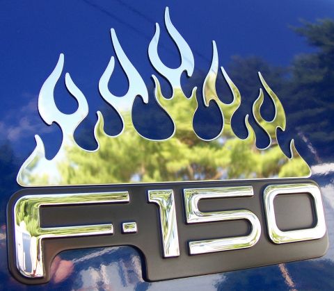 1998 Ford F-150 - Chrome flame decals and F-150 badge on a blue 1998 Ford F-150.