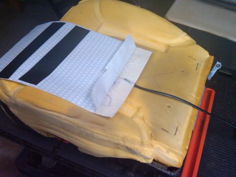 1993 Ford Bronco - A car seat foam cushion is shown with a heating element installed, ready for upholstery.
