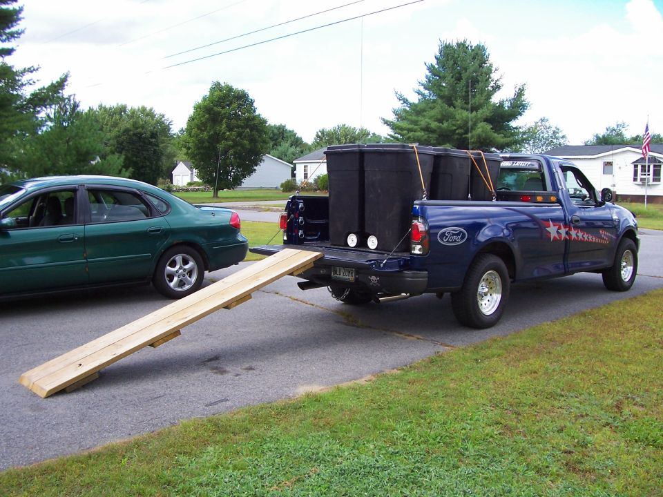 Pine needle removal using six 50 gallon Rubermaid containers on wheels.